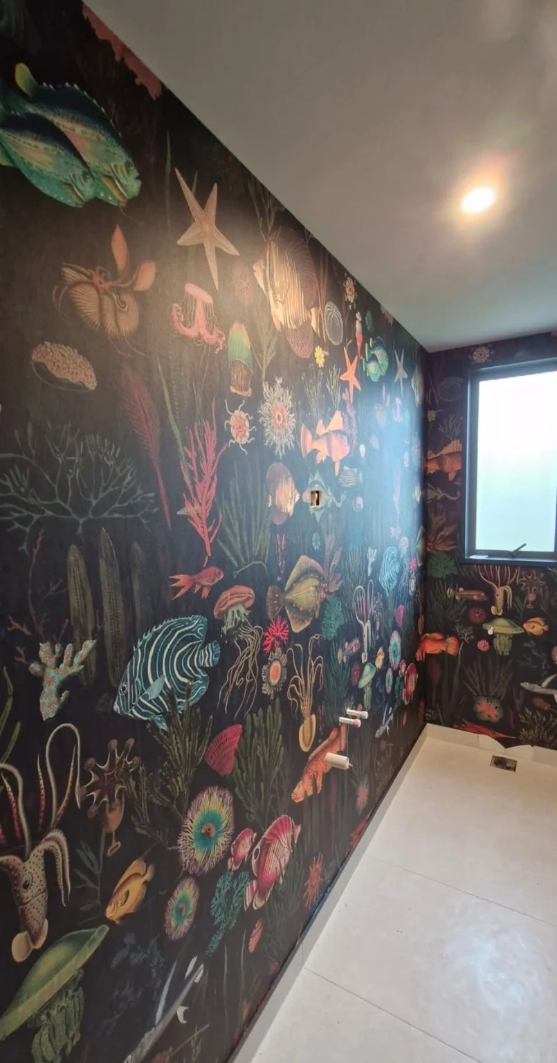 Colourful marine-life wallpaper installed as part of Trevor’s decorating work